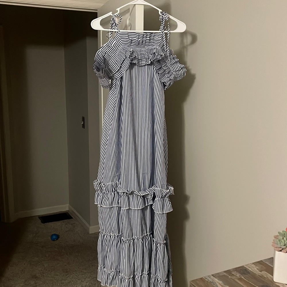 Never worn! Just a little tight in the chest area!